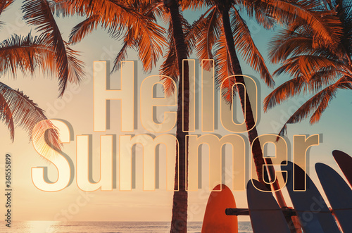 Hello summer words on tropical palm tree background. Summer vacation and travel holiday concept.