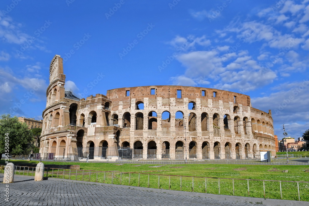 Colosseum plain view, no people under a clear sky 