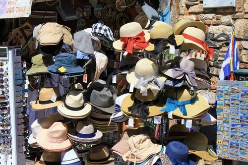 Greece, Athens, June 17 2020 - Hats stacked on stands outside store at Monastiraki square.