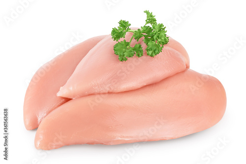 Fresh chicken fillet with parsley isolated on white background with clipping path and full depth of field.