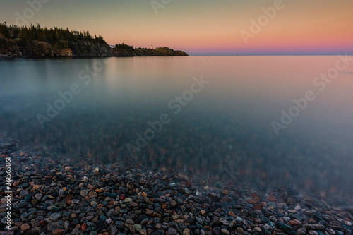 Long Exposure of Rocky Shoreline and Lighthouse © Sean O'Hare