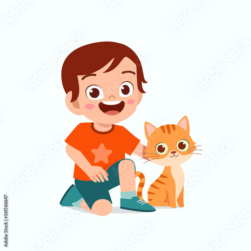 happy cute little kid boy play with pet cat © Colorfuel Studio