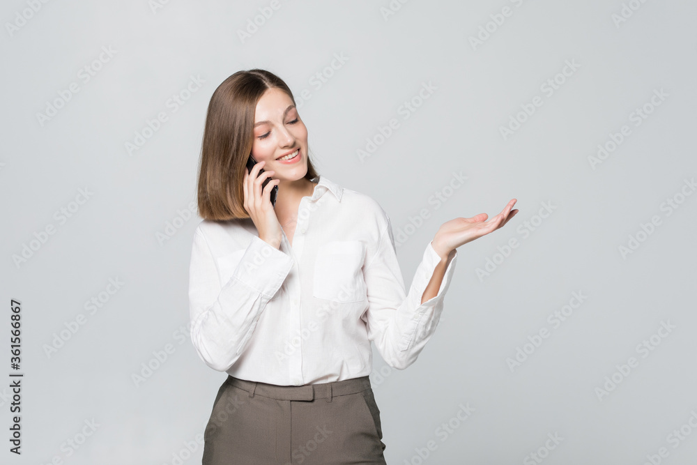 happy confident businesswoman talking on the mobile phone isolated on white background happy confident businesswoman talking on the mobile phone isolated on white background