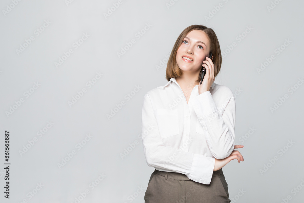 Portrait of smiling business woman phone talking on white background Portrait of smiling business woman phone talking on white background