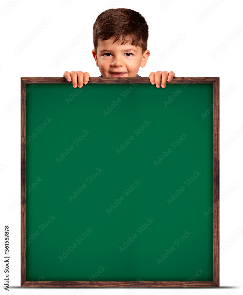 Child looking over green chalkboard on white background. concept school.