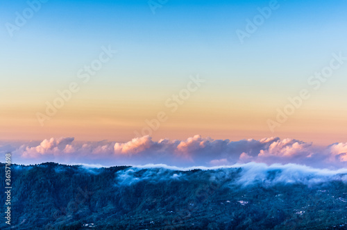 Amazing panorama view on clouds above mountain from top of Batur volcano © dvad