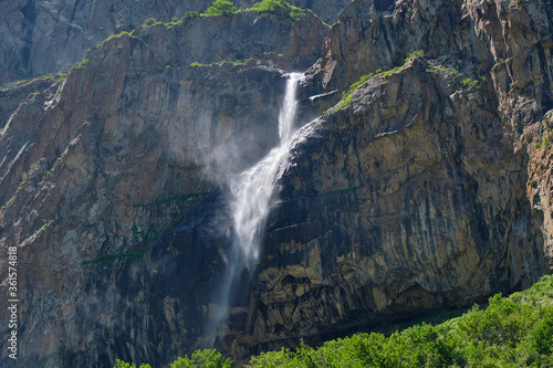high in the mountains waterfall on the rocks © Oleg Korotkov