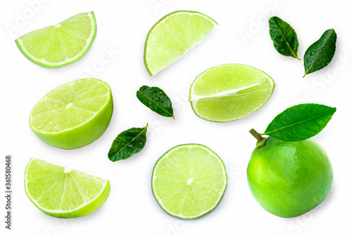 Close up fresh whole Lime fruits with green leaf and slice isolated on white background. Top view.
