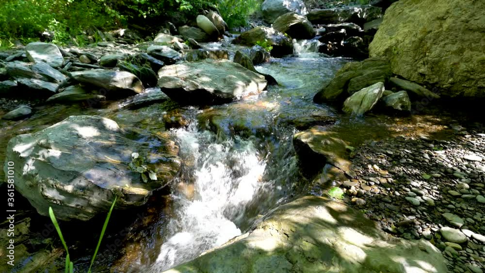 high mountain waters going down the river high mountain waters going down the river
