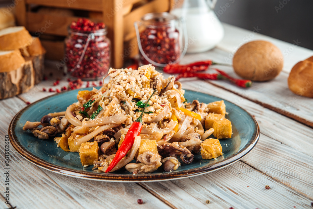 Asian pad thai noodle with seafood and tofu Asian pad thai noodle with seafood and tofu