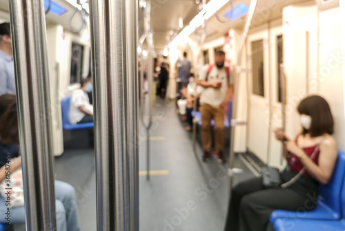 Image of soft focus people on the subway