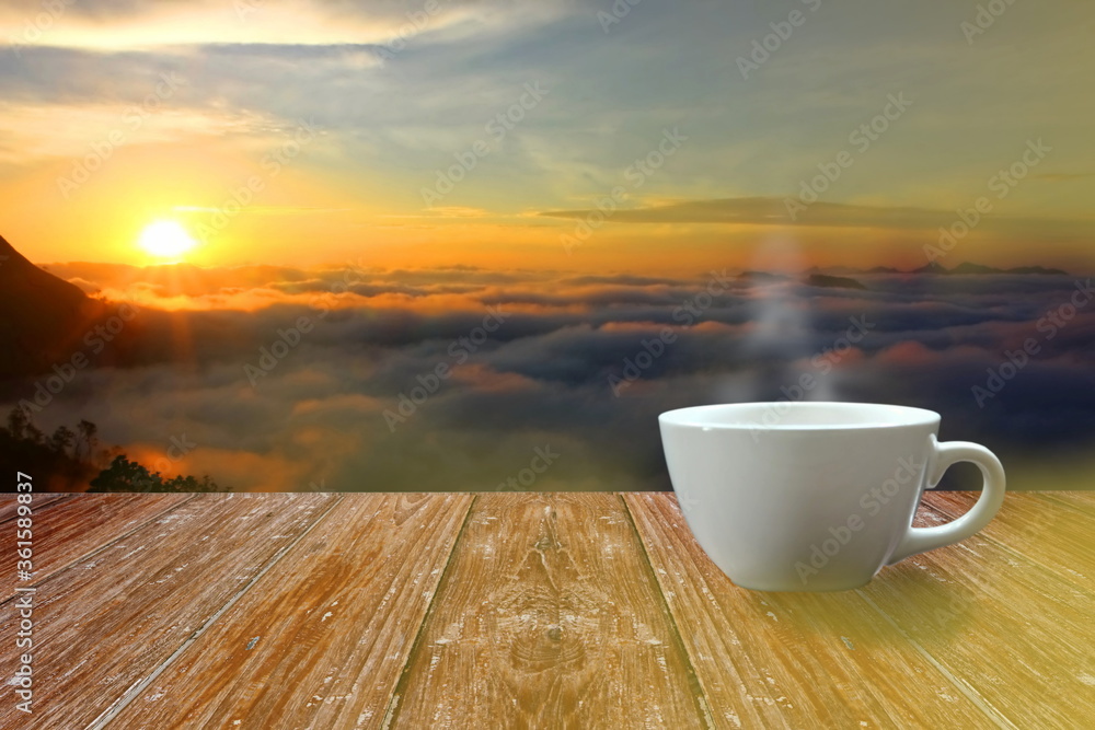 white coffee cup on wood floor against during sun rise landscape white coffee cup on wood floor against during sun rise landscape
