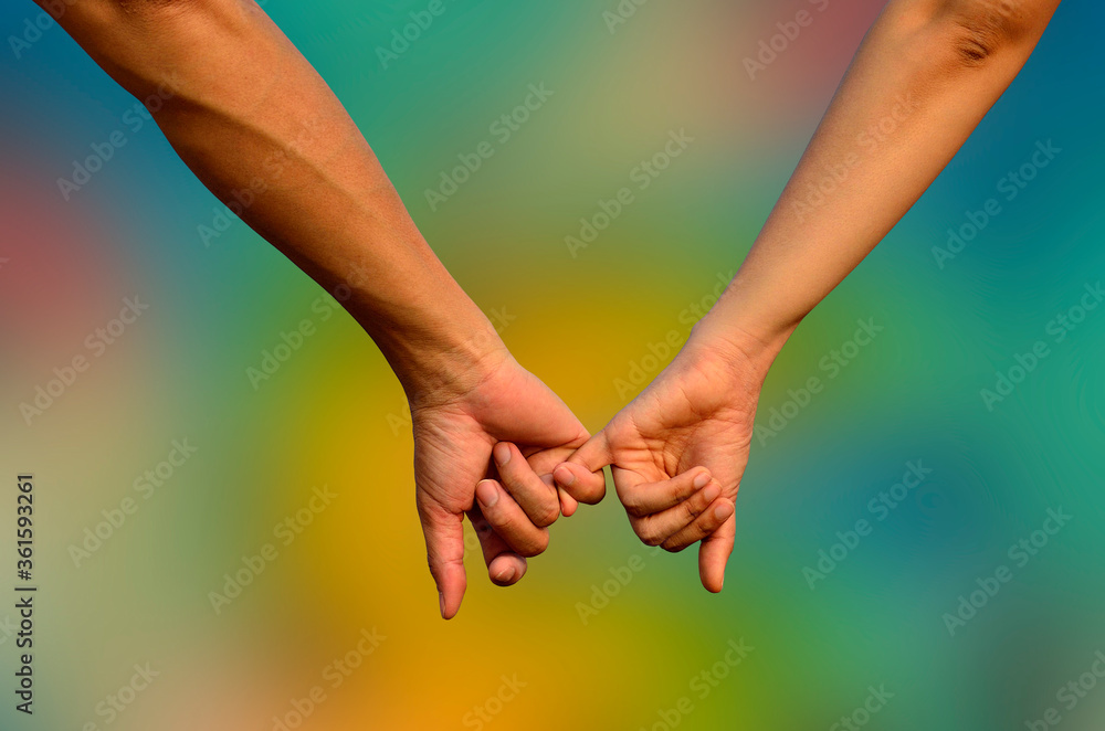 Hands in Hands with romantic together on colorful blue background Hands in Hands with romantic together on colorful blue background