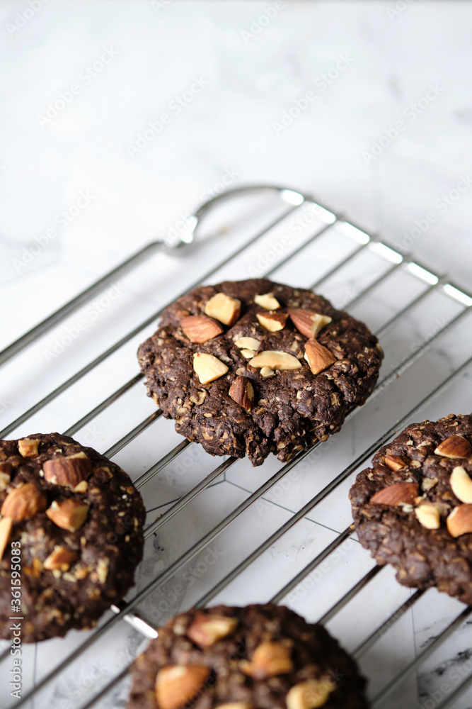 Obraz premium Fresh Baked Dark Chocolate with Almond nut cookies.
