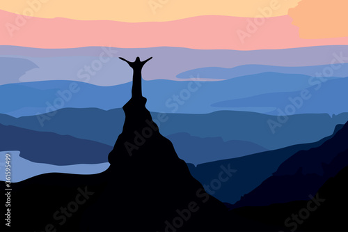 A man on top of a mountain