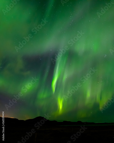 Iceland Northern Lights bursting in the night sky © Daniel