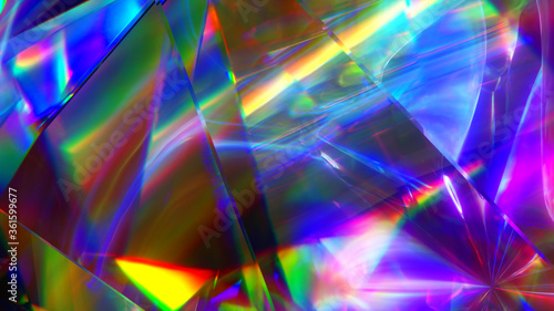 The light passes through the facets of a slowly rotating diamond and creates repetitive sparkling highlights and bright rainbow colors. Rainbow dispersion of light. 3d illustration © flashmovie