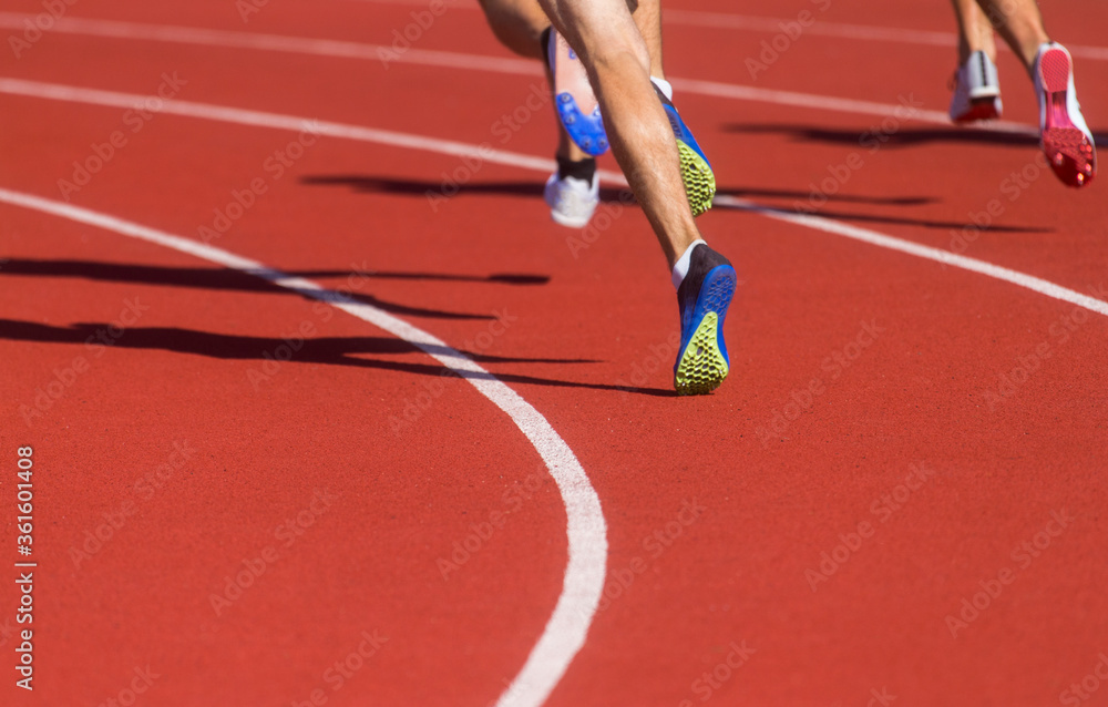 Athletics people running on the track field. Sports and healthy lifestyle concept.