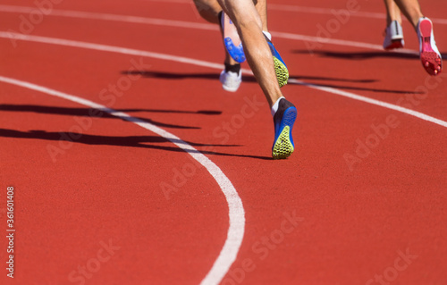 Athletics people running on the track field. Sports and healthy lifestyle concept.