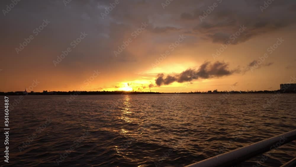pan industry factory release smoke at sunset time to ship harbor with river side view pan industry factory release smoke at sunset time to ship harbor with river side view
