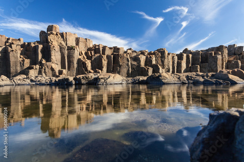 Bombo Headland Quarry Australia. Blue skies and reflections in water