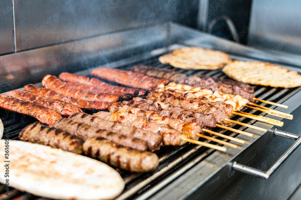 Greek Meats on Grill, Lamb, Feta, Pork, Sausages, Skewers Greek Meats on Grill, Lamb, Feta, Pork, Sausages, Skewers