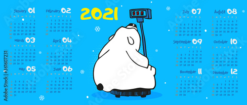 Calendar 2021. Polar bear sits on the scales, blue background, cartoon animal. Vector illustration