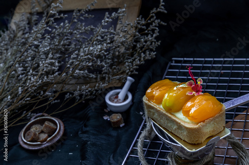 Traditional French sweet dessert : Mayomgchid tart on beautiful background. One piece, Delicious seasonal breakfast, Selective focus. photo