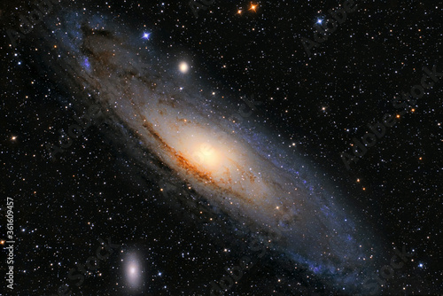 Andromeda Galaxy (M31) and its satellite galaxies (M32 and M110) in Andromeda constellation photo