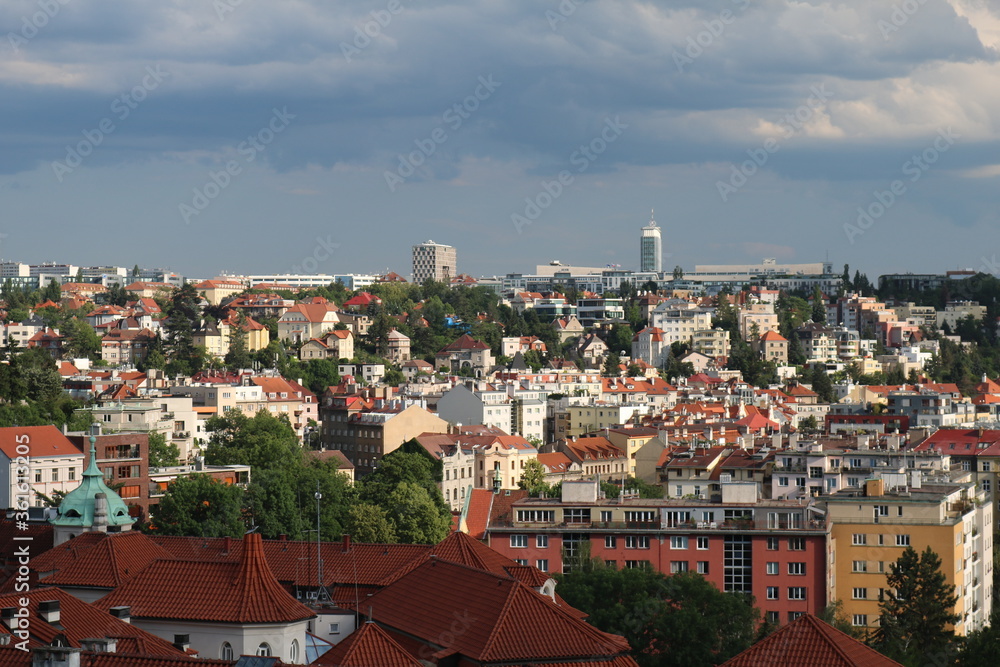 Aerial panorama of Prague on a hot, cloudy summer day