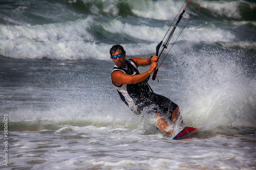 Photography Kiteboarder enjoy surfing in ocean. Vietnam