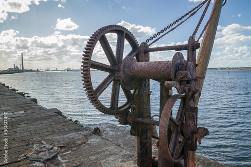 Photography The old crane in Poolberg Lighthouse, Dublin. Ireland
