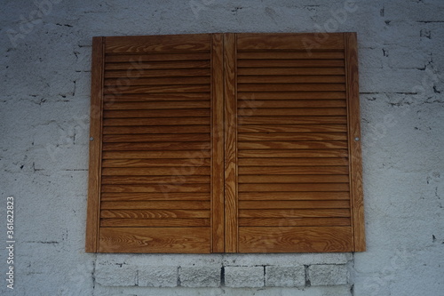 old wooden window with shutters