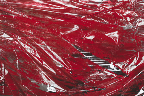 red plastic stretch membrane painted red as background