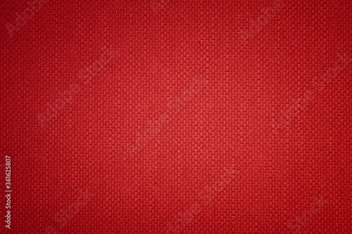Red vintage plain fabric background suitable for any graphic design, poster, website, banner, greeting card, background
