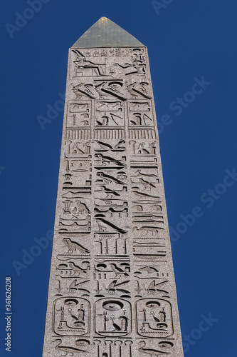 Wallpaper Mural Famous 23 meters ancient Luxor Obelisk (Obelisque de Louxor, 1836) at the center of the Place de la Concorde in Paris, France