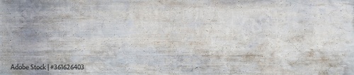 Panorama of a grungy concrete wall as background or texture