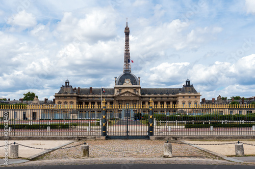 The Military School (Ecole Militaire) backyard entrance with the Eiffel tower in the background - Paris, France. photo