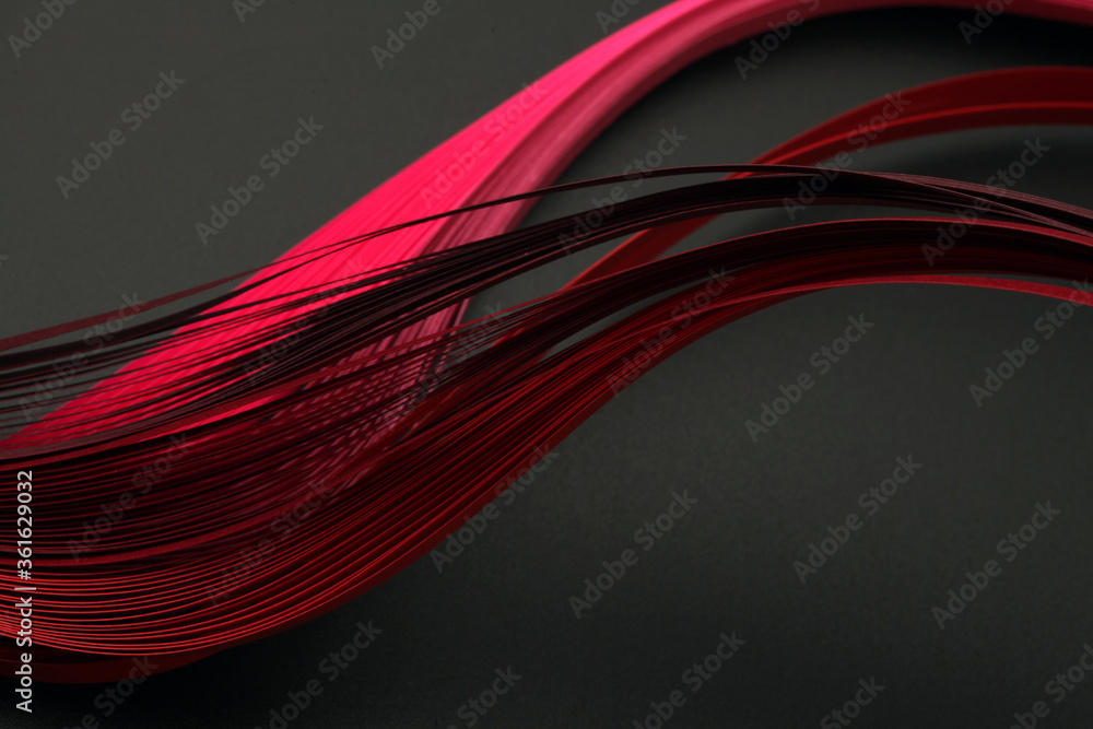 Red color strip wave paper. Abstract texture black background. Red color strip wave paper. Abstract texture black background.