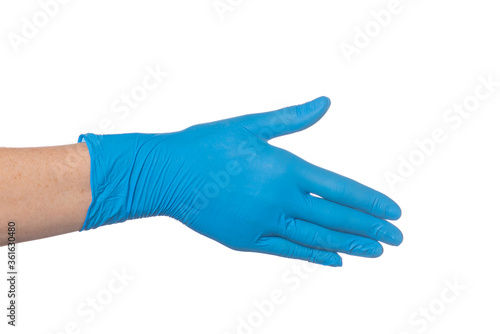 handshake gesture - hand in a nitrile blue glove on a white background