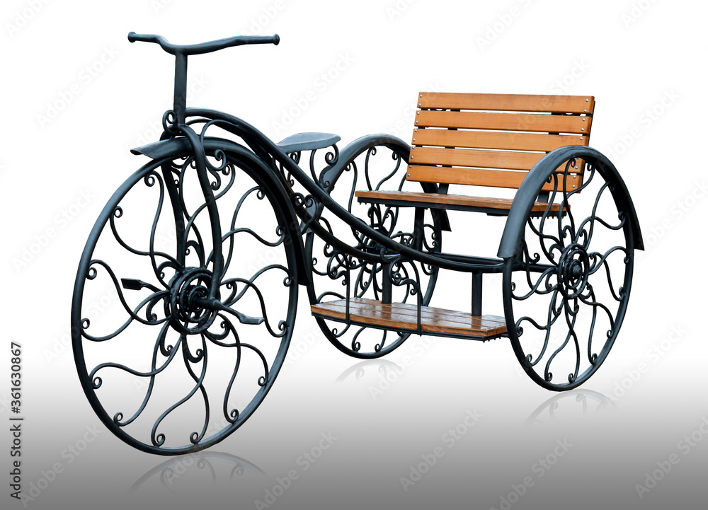 Fototapeta premium Three-wheeled bicycle, chariot on a white background and with reflection