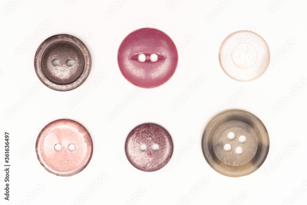Old buttons collection isolated on the white background. Old buttons collection isolated on the white background.