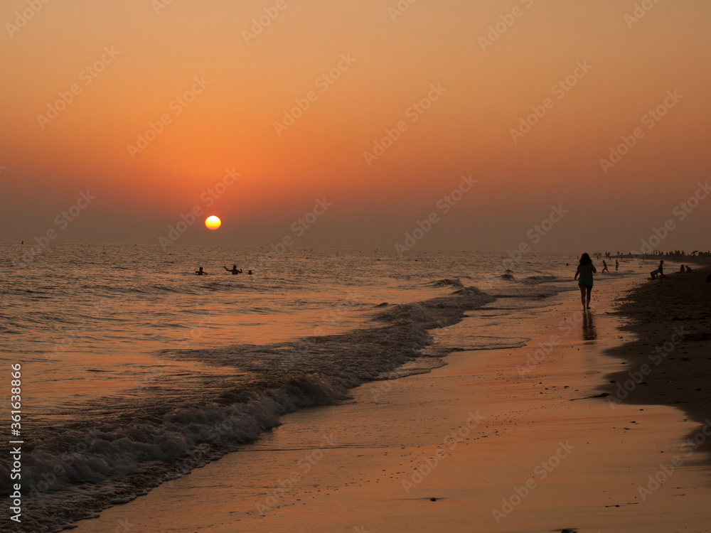 walk on the beach at sunset