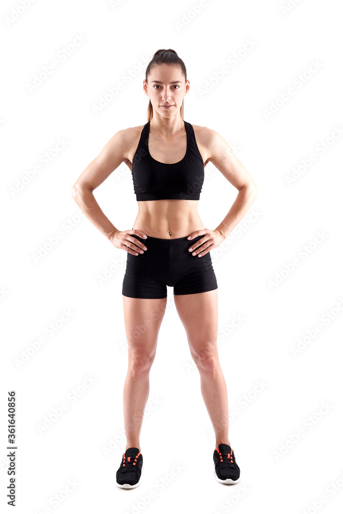 Young female fitness model on white Young female fitness model on white
