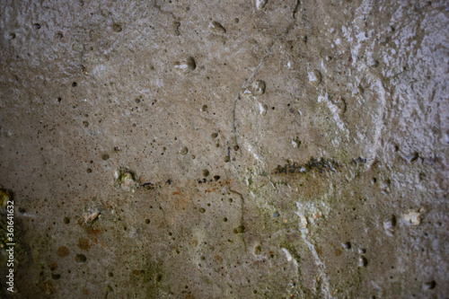 Cement wall concrete texture wet after rain old and dirty