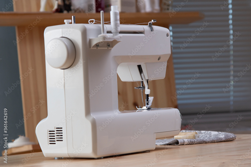 Close-Up Of Sewing Machine at home interior