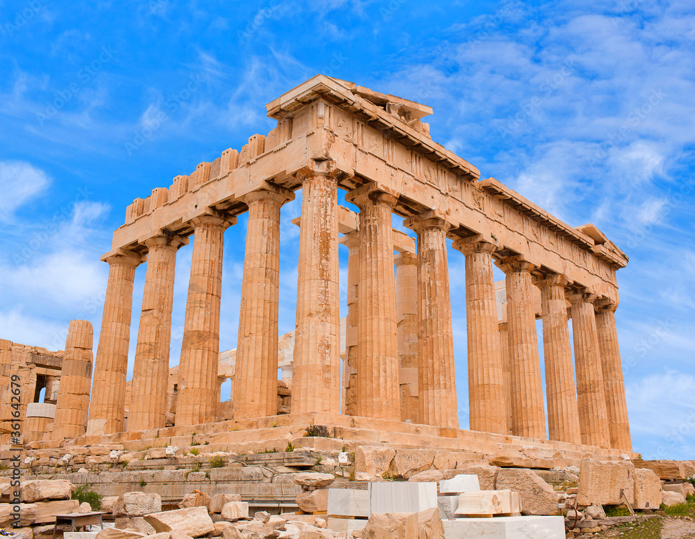 Famous ancient  Greek Parthenon temple on a bright day at Acropolis in Athens, Greece