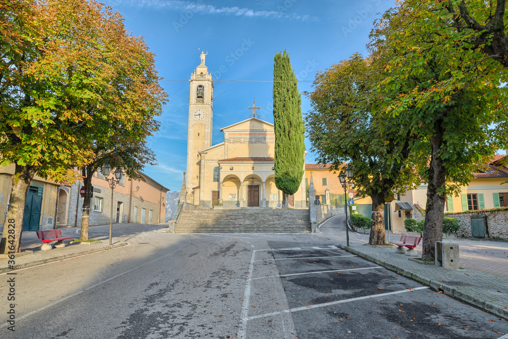 Historic center of the town of Cesana Brianza  with the church of San Fermo e Rustico (15th century), square Borromeo. Small town on Lake Pusiano in northern Italy