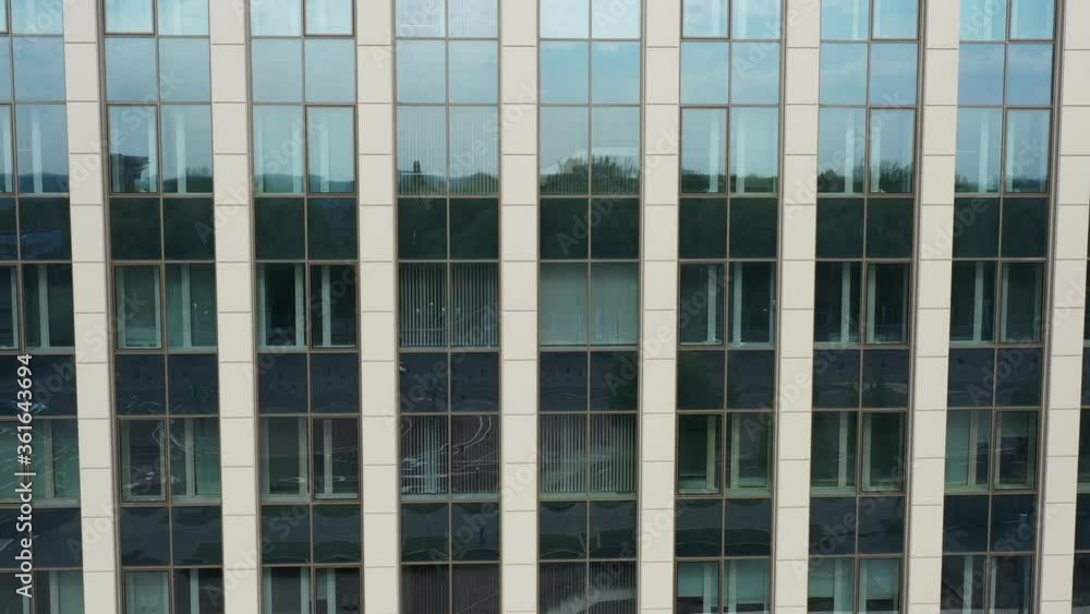 Modern architecture background with structural glazing / windows. Abstract High Rise Building. View of typical glass wall facade of generic modern office skyscrapers.
Modern architecture background with structural glazing / windows. Abstract High Rise Building. View of typical glass wall facade of generic modern office skyscrapers.
