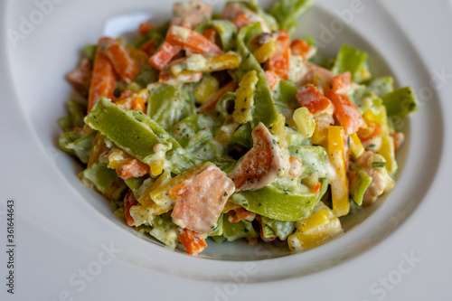 Salmon and Spinach Fettuccine pasta on white dish